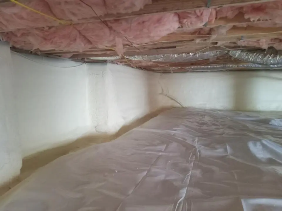 Crawl space encapsulation with closed-cell spray foam for Commercial Roof Restoration in Goshen
